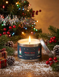Winter Berry Christmas tin scented candle lit with gnome design